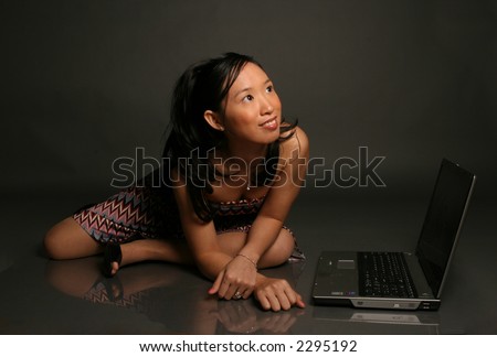 asian woman with laptop