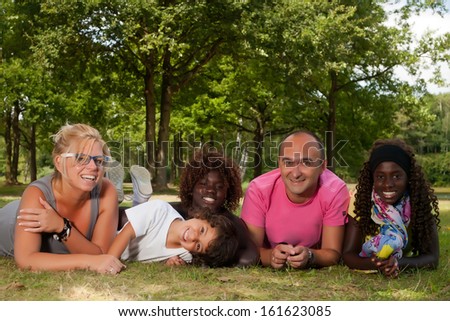 Happy multicultural family having a nice summer day