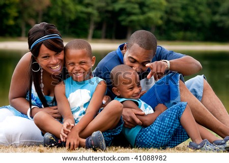 Happy black family enjoying their free day