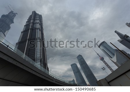Looking up at a group of modern office  skyscrapers buildings