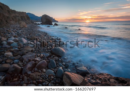 Seashore landscape sunset.