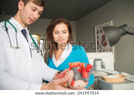 doctor consult patient with heart problems