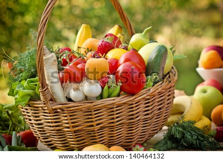 Fresh fruits and vegetables in the wicker basket