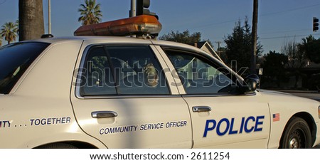 Blonde Female Police officer in cop car