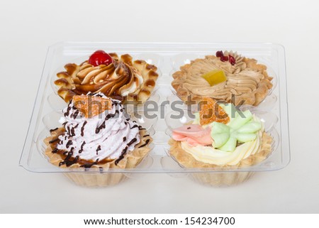 Set of cakes in packing close up