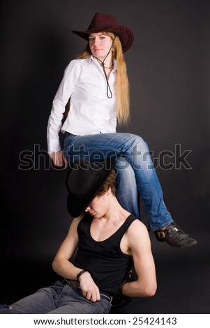 The man sleeps near feet of the young woman