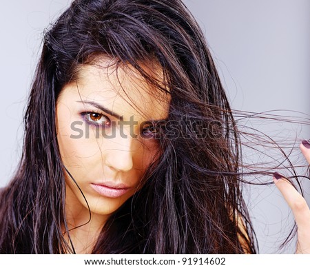 Portrait of a pretty woman with wet hair