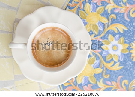 Coffee cup with smoke on table