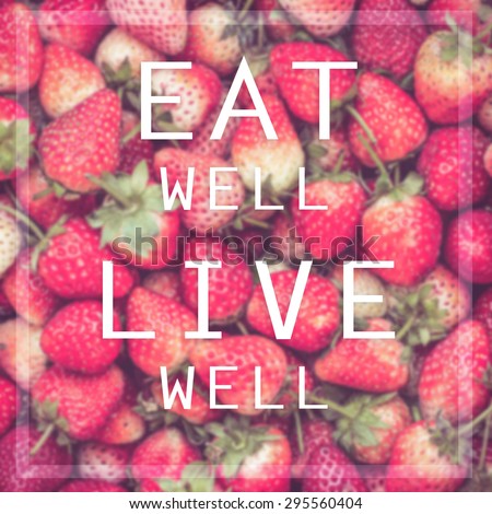 Good quote on strawberry background , Eat well live well