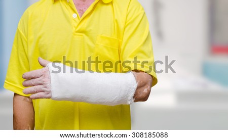 Man with his broken left arm.