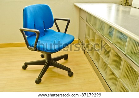 Blue Arm Chair in office