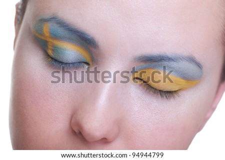 Young girl is dreaming about score in match between Sweden and Ukraine: EURO 2012, group D, 11th of June. Focus on eyelashes.