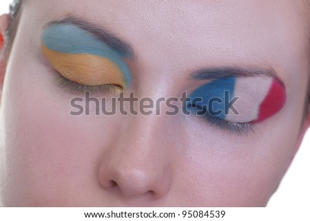 Young girl is dreaming about score in match between France and Ukraine: EURO 2012, group D, 15th of June. Focus on eyelashes.