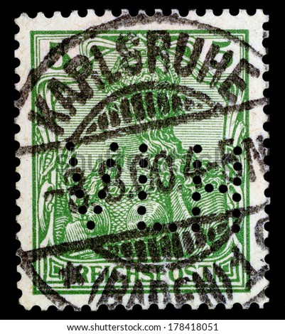 KARLSRUHE, GERMANY - AUGUST 3, 1900: Macro photo of a very old German Stamp canceled in Karlsruhe on August 3, 1900. Very old one from the beginning of the last century.