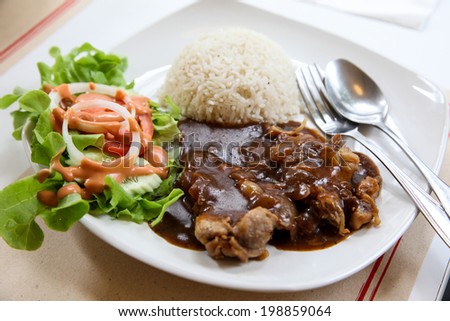 chicken with black pepper sauce and rice
