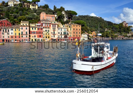 View on streets and boats of Portofino from the sea. An Italian fishing village and upmarket resort famous for its picturesque harbour. Portofino, Liguria, Italy