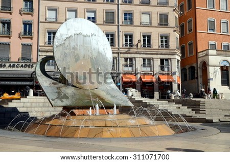 LYON, FRANCE - AUGUST 28:  Louis Pradel square near Lyon\'s Opera and its modern fountain. Lyon, France - August 28, 2015