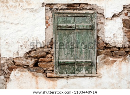 Similar – Foto Bild Altes Holzfenster mit Insektengitter in alter silbergrauer Wellblechfassade eines Wohnhaus im Sommer bei Sonnenschein im Dorf Maksudiye bei Adapazari in der Provinz Sakarya in der Türkei