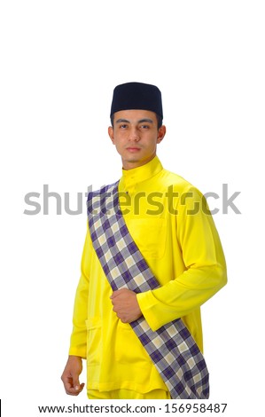 Asian muslim male with traditional Malay costume in smiling action, Baju Melayu