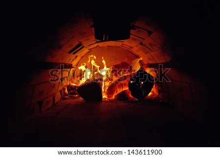 traditional Italian pizza wood oven, fire detail