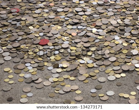 Coins thrown away in hope for luck