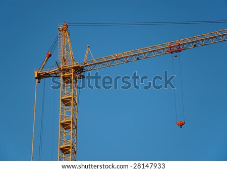 The crane on a background of the sky