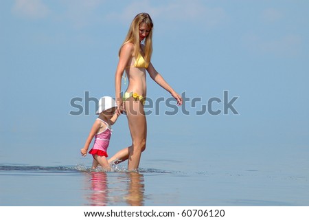 Mother with child walk on the water
