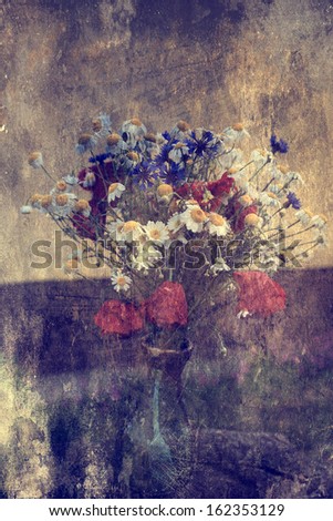 Antique photo of wild flowers in vase