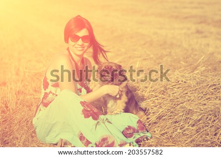 Vintage photo of woman with a dog