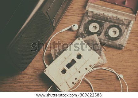 Retro cassette tape and player.Vintage effected photo
