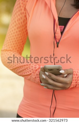 Runner woman with smart phone