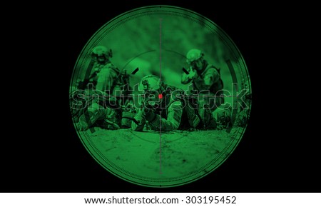 sniper during night mission/operation hostage rescue.view through the night vision scope