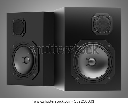 two black audio speakers isolated on gray background