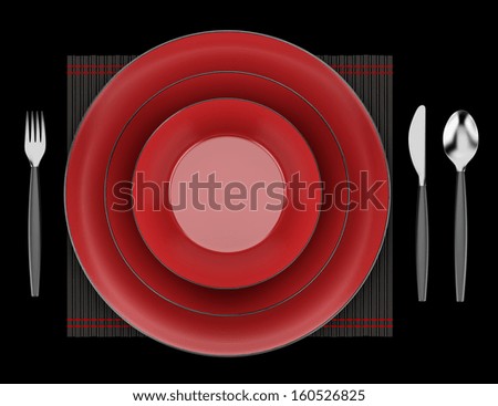 black and red table setting isolated on black background