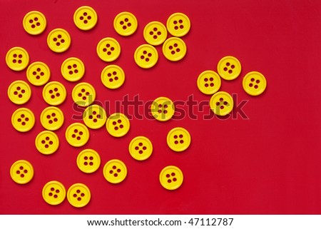 yellow  buttons on red background