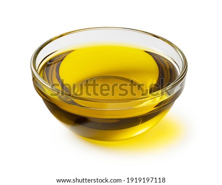 Olive oil in a crow bowl on a white background