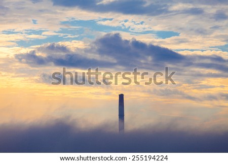 Pipe THERMAL POWER STATION in the cloud a morning sky