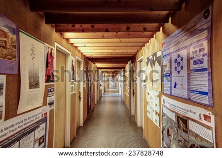 BURNABY, CANADA - MAY 29, 2014: Looking down long hallway of offices at a university