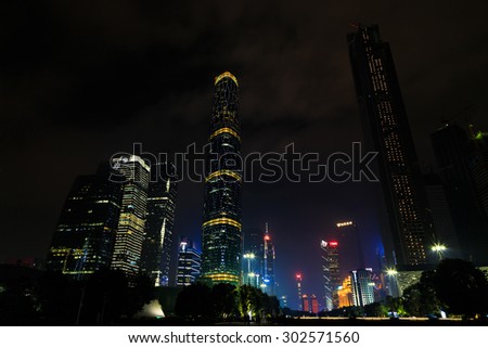 GUANGZHOU,CHINA - JANUARY 2: Office towers near park and museum, JAN 2,2015, Guangzhou, China. Office towers at night near public park and museum