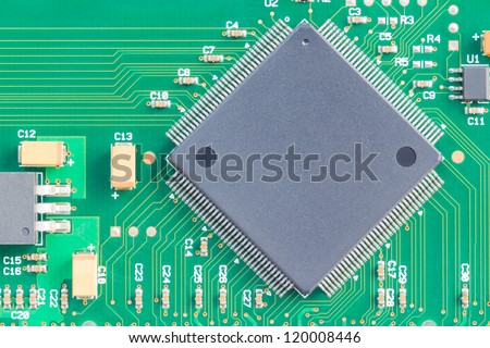 Surface mount technology (SMT) microchip on plated through hole pcb