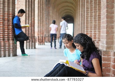 Indian / Asian College students preparing for examination.