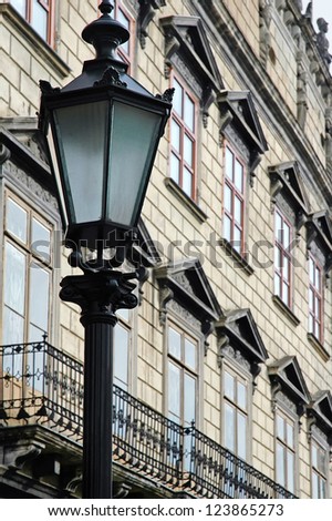 Cityscape - Street light on the background of the old building in Lvov, Ukraine
