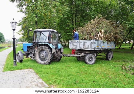 GOMEL, BELARUS - AUGUST 27: In Belarus, the whole country was held a community work day on cleaning of parks and squares on August 27, 2012 in Gomel, Belarus. On photo - garbage collection in the park