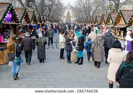 LVOV, UKRAINE - DECEMBER 27: In the center of Lvov on Market Square opened Christmas and New Year\'s Bazaar on December 27, 2013 in Lvov, Ukraine