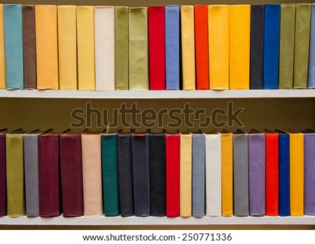 Color books on the shelf in the library