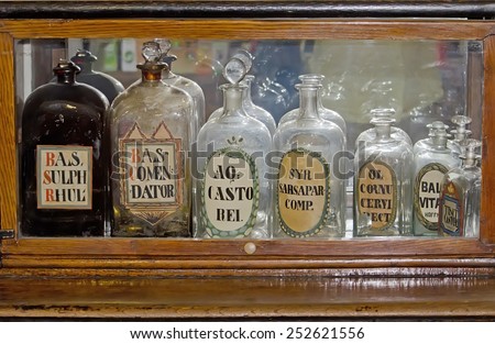 LVOV, UKRAINE - APRIL 29: Empty retro medical drug bottles in an old pharmacy-museum on April 29, 2012 in Lvov, Ukraine