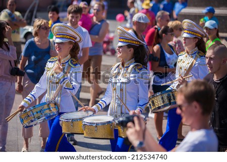 ODESSA, UKRAINE - August 23: Flash mob in city of Odessa on Potemkin Stairs on August 23, 2014, in day of a national flag of Ukraine. Happy drummers of summer Flash mob