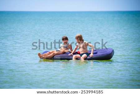 children having fun on air bed