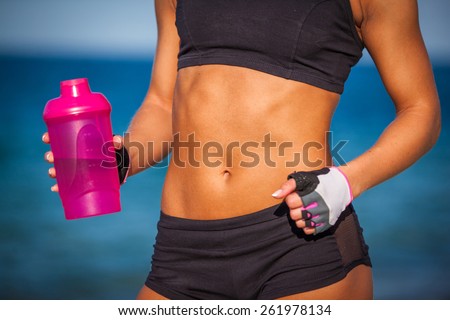 Close-up of torso of athletic fitness woman