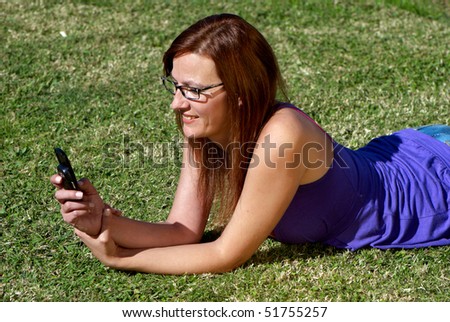 Talking woman on grass